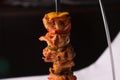 CHICKEN SHISH TAWOOK with onion, tomato, lemon and pita bread served in dish isolated on table side view of arabic bbq food