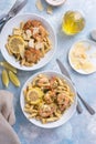 Chicken and shrimp piccatta with penne pasta Royalty Free Stock Photo