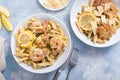 Chicken and shrimp piccatta with penne pasta Royalty Free Stock Photo