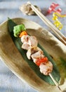 Chicken skewers and vegetable dipping sauce. top view. selective focus Royalty Free Stock Photo