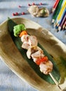 Chicken skewers and vegetable dipping sauce. top view. selective focus Royalty Free Stock Photo