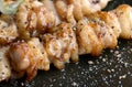 Chicken skin grilled or torikawa yakitori.