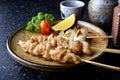 Chicken skin grilled or torikawa yakitori.