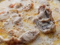 Chicken slices cooked in a creamy sauce