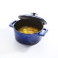 Chicken Soup in a Blue Pan Isolated Side View Royalty Free Stock Photo