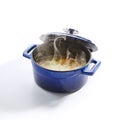 Chicken Soup in a Blue Pan Isolated Side View Royalty Free Stock Photo