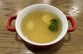 Chicken soup broth with egg