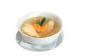 Chicken soup with carrots and sage in bowl