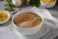 Chicken soup , chicken broth, with pieces of chicken and vegetables and shkedei marak an Israeli food product Royalty Free Stock Photo