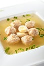 Chicken Soup with Meatballs Decorated with Boiled Quail Egg