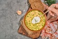 Chicken soup with vegetables and mushrooms, top view, close-up. Served with black bread, sour cream and garlic. A healthy hot Royalty Free Stock Photo