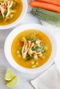 Chicken soup and in white bowl mexican food broth in mexico city