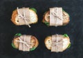 Chicken and spinach sandwiches wrapped in craft paper Royalty Free Stock Photo