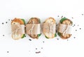 Chicken and spinach sandwiches wrapped in craft paper Royalty Free Stock Photo