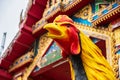 Chicken statue in front of temple Thailand