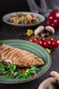 Chicken steak roasted and salad, food photography. Black background. Top view Royalty Free Stock Photo