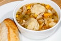 Chicken stew and dumplings. Hot winter comfort food close up
