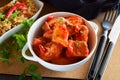 Chicken stew with pineapple and chili tomato sauce in a white bowl Royalty Free Stock Photo