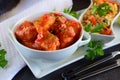 Chicken stew with pineapple and chili tomato sauce in a white bowl Royalty Free Stock Photo