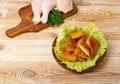 Chicken Strips, Breaded Nuggets on Wood Plate, Crispy Fry Chicken Meat with Lettuce, Fried Crunchy Fillet Pieces Royalty Free Stock Photo