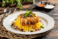 Chicken Tah Chin with nuts served in dish isolated on table top view of arabic breakfast