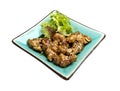 Chicken thigh fried in Teriyaki sauce. Isolated on white background