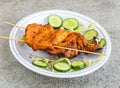 chicken tikka breast piece served in plate isolated on grey background top view of pakistani and indian spices food