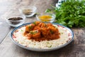 Chicken tikka masala with basmati rice on wood Royalty Free Stock Photo