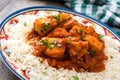 Chicken tikka masala with basmati rice on wood Royalty Free Stock Photo