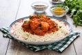 Chicken tikka masala with basmati rice on wood Royalty Free Stock Photo