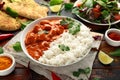 Chicken tikka masala curry with rice and naan bread Royalty Free Stock Photo