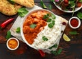 Chicken tikka masala curry with rice and naan bread Royalty Free Stock Photo