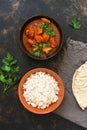 Chicken Tikka masala with rice in the bowl. Indian food. Top view, copy space. Royalty Free Stock Photo