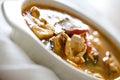 Chicken tom yum on white fabric Royalty Free Stock Photo