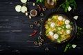 Chicken and vegetable soup with meatballs, zucchini and pasta. Royalty Free Stock Photo