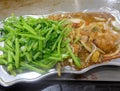 Chicken with vegetables on hot plate,teppanyaki cooking