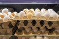 chicken white and brown eggs in a cardboard container Royalty Free Stock Photo