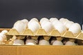 chicken white eggs in a cardboard container in the supermarket. Royalty Free Stock Photo