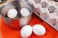 Chicken white eggs in saucepan ready for cooking Royalty Free Stock Photo