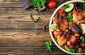 Chicken wings of barbecue in sweetly sour sauce. Picnic Royalty Free Stock Photo