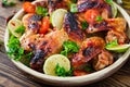 Chicken wings of barbecue in sweetly sour sauce. Picnic. Royalty Free Stock Photo
