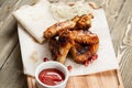 chicken wings grill. Serving on a white plate on a table. Barbecue restaurant menu, a series of photos of different Royalty Free Stock Photo