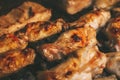 Chicken wings prepared on the grill during a barbecue Royalty Free Stock Photo