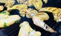 Chicken wings on smoking grill closeup Royalty Free Stock Photo