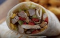 Chicken Wrap. Chicken fajita tortilla wrap sandwich. Tasty wraps with grilled chicken meat and fresh parsley Royalty Free Stock Photo