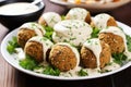 chickpea falafel balls served with tahini sauce