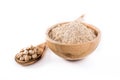 Chickpea flour in wooden bowl isolated