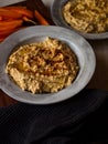 Chickpea hummus home made in natural light on farm table Royalty Free Stock Photo