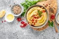 Chickpea hummus with tahini in a bowl. Healthy vegetarian appetizer.