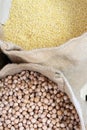 Chickpea. Organic chickpeas and millet in sack. Chickpea grains in a bag